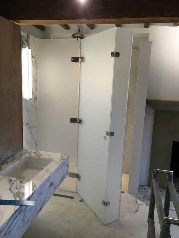 Bespoke frosted glass shower enclosure in Lee luxury bathroom